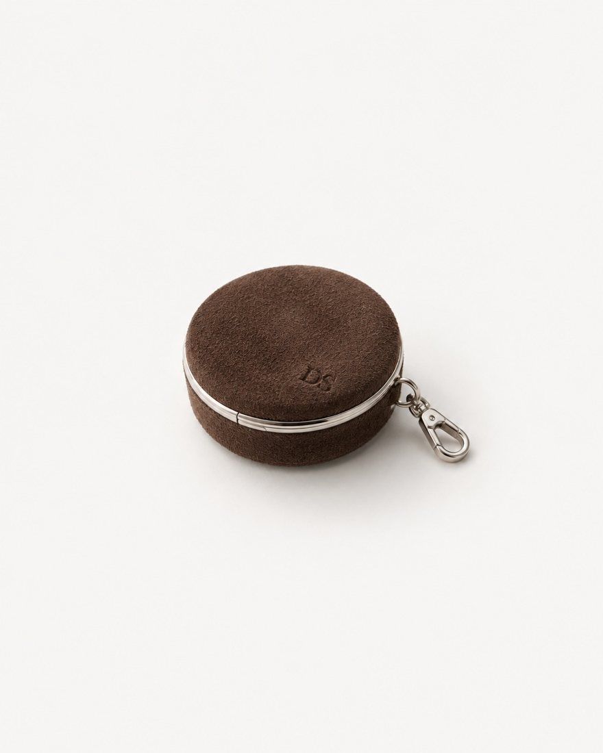 Customise your FIL-O: round compact wrapped in chocolate suede with embossed initials